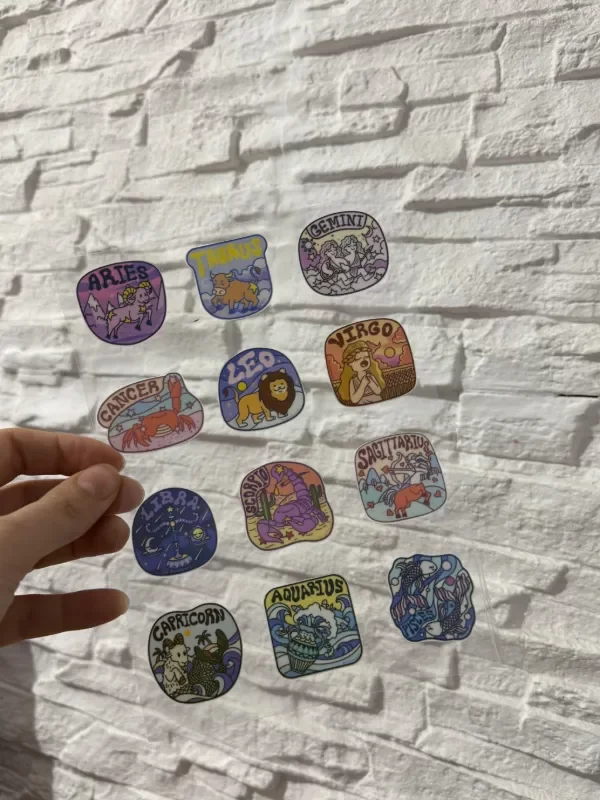 Producto - Plancha Stickers UV Signos