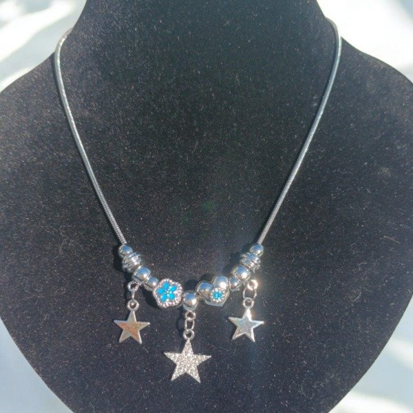 Producto - Collar acero con dijes estrellas