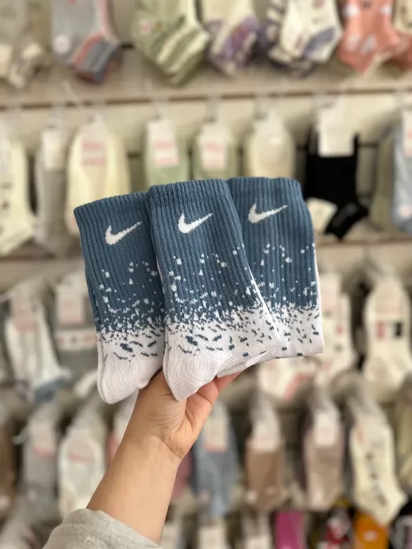 Medias 3/4 nike pintas celeste