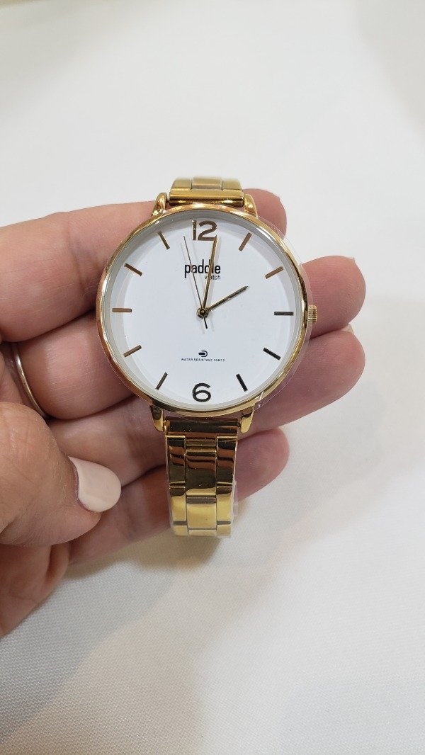 Producto - Reloj paddle dorado redondo