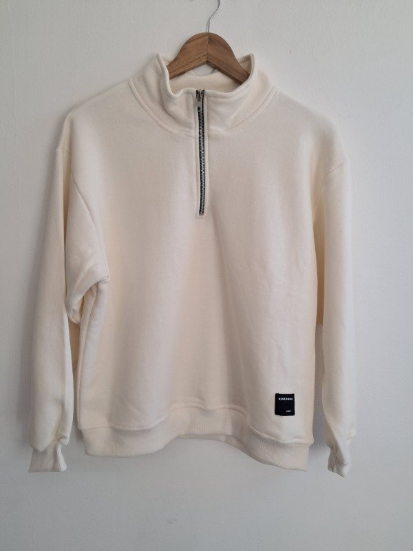 Producto - Buzo Polo Hueso