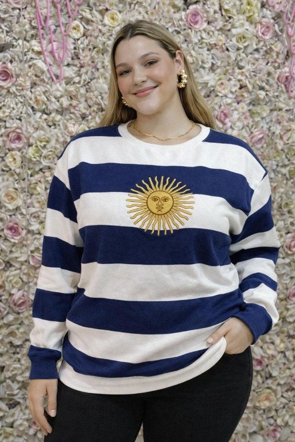 Producto - LINEA GALERY Buzo friza sol de mayo