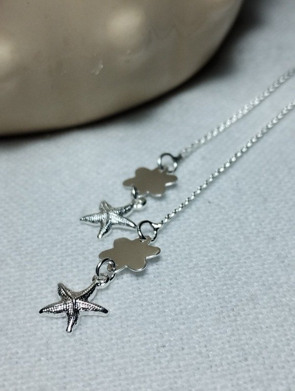 Producto - Aros colgantes flor estrella