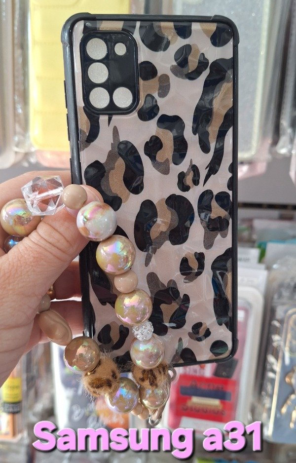 Producto - Funda animal print con strapp. Samsung a31