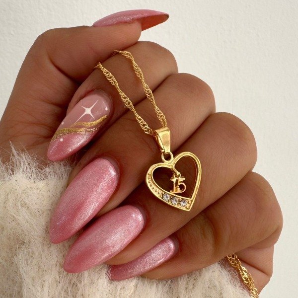 Producto - CONJUNTO BAÑADO CORAZON CALADO CON DIJE 15 COLGANTE