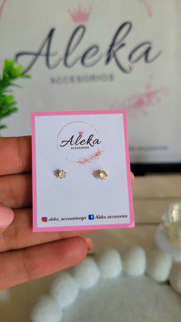 Producto - Aros punto de luz de acero dorado