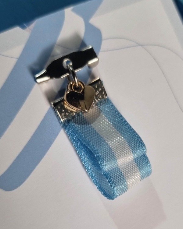 Producto - Escarapelas con dijes