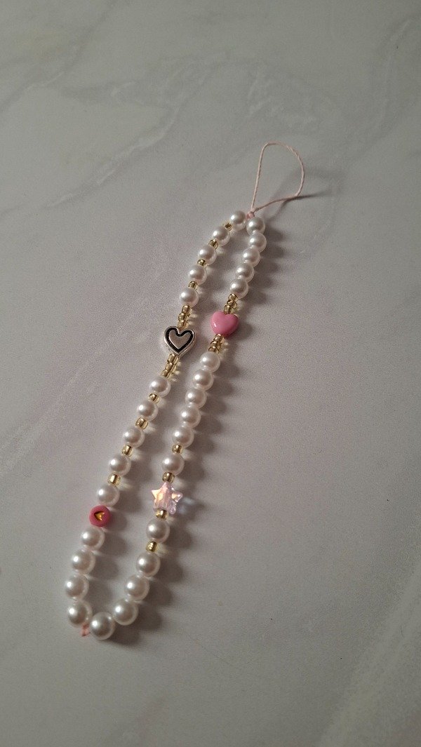 Producto - Strap Phone perlado rosa corazón