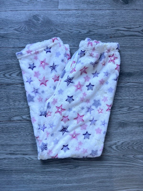 Producto - Pantalón plush luminoso blanco estrellas colores