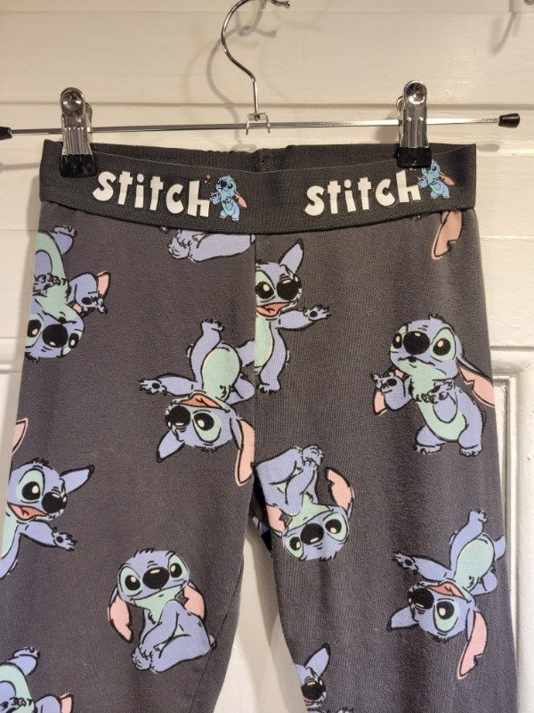 Producto - Calza PRIMARK gris logo stitch Talle 9/10 años- PRECIO: 12X - 2