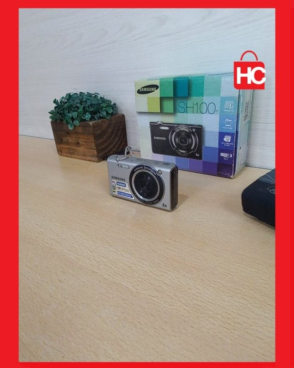 Producto - Cámara digital compacta Samsung SH100 con Wi-Fi - Completa con caja y funda - 2
