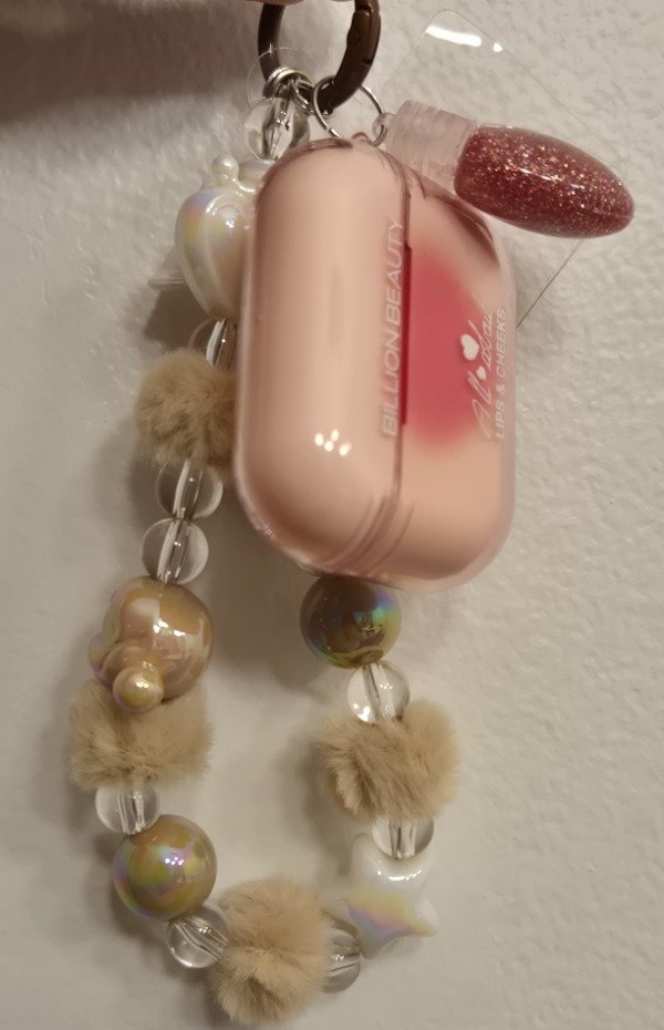 Producto - Gloss airpods +llavero