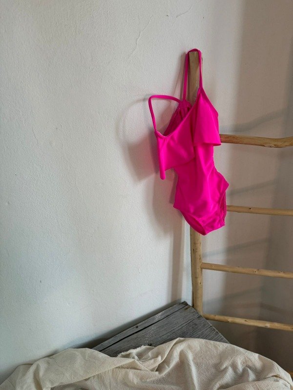 Producto - Enteriza nena volado fuccia