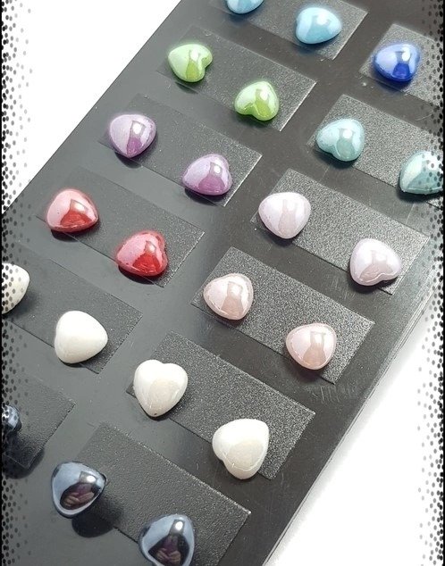 Producto - Aros abridores corazon perlados