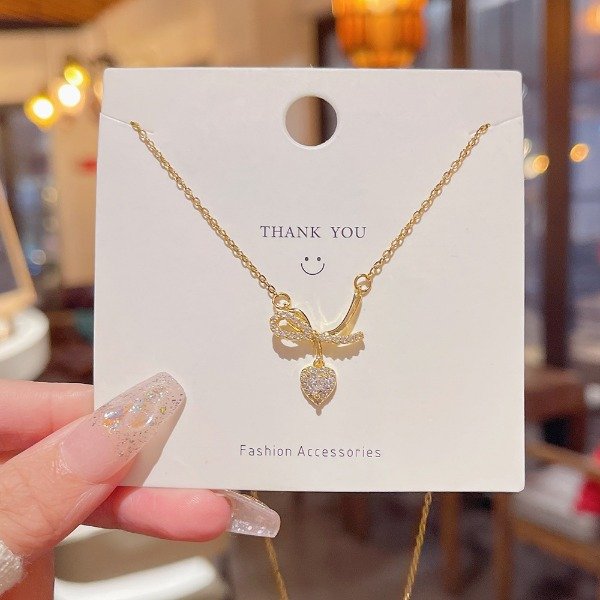 Producto - Collar con lazo y corazón brillante  - ternura con brillo X264