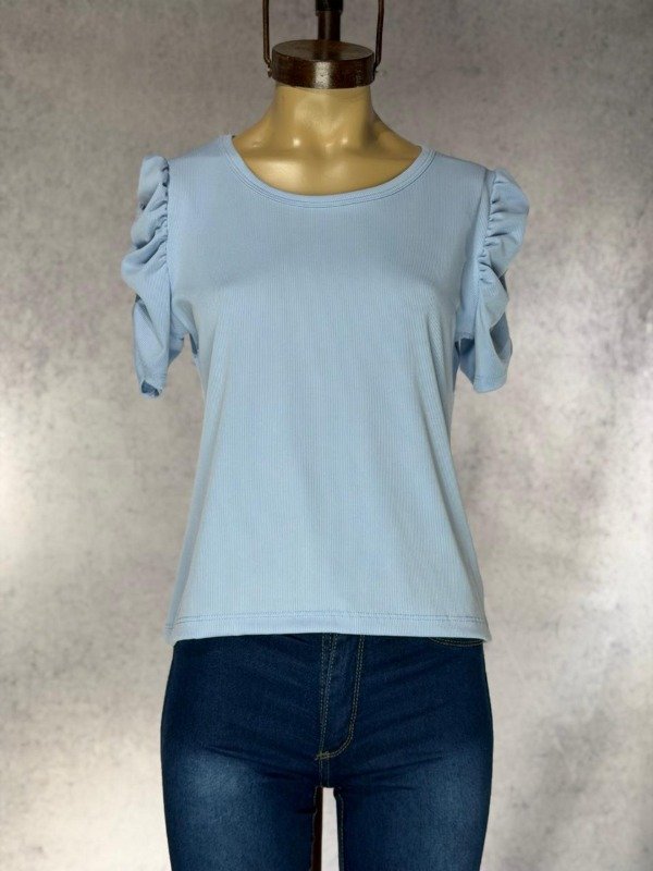 Producto - REMERA CALE CELESTE PRINCESA MORLEY