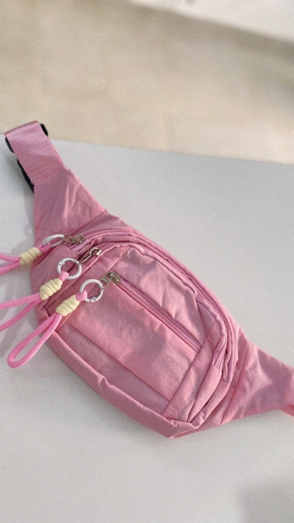 Producto - Riñonera. Tela impermeable. Premium. Rosa