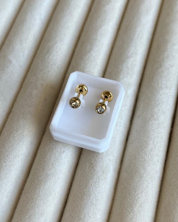Producto - Aros abridores bolita transparente de acero dorado
