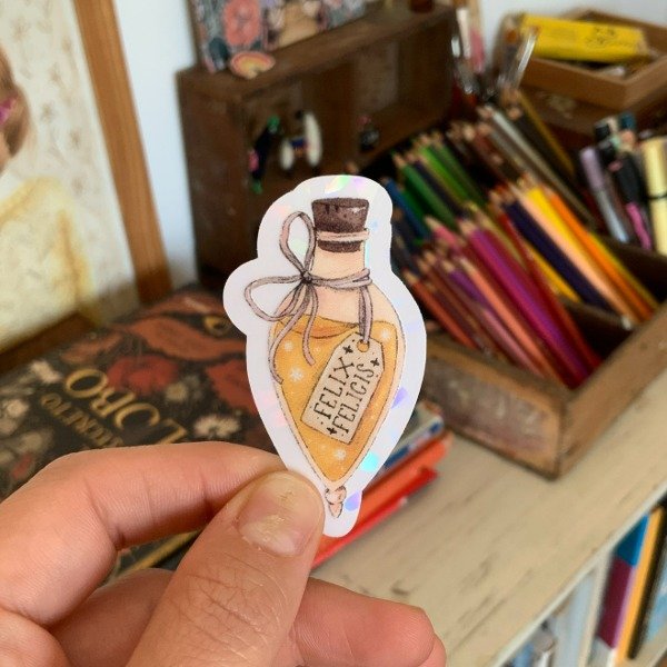 Producto - Sticker Vinilo Holográfico Felix Felicis