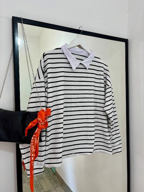Producto - Buzo chomba blanco con líneas