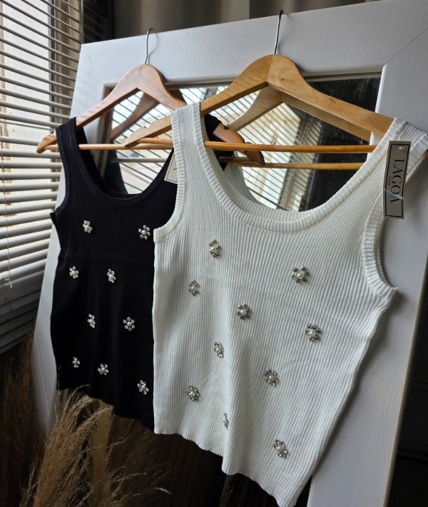 Producto - Remera importada flores piedras R66