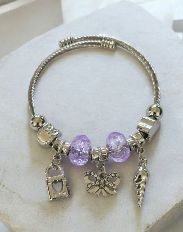 Producto - Pulsera acero dona lila caracola