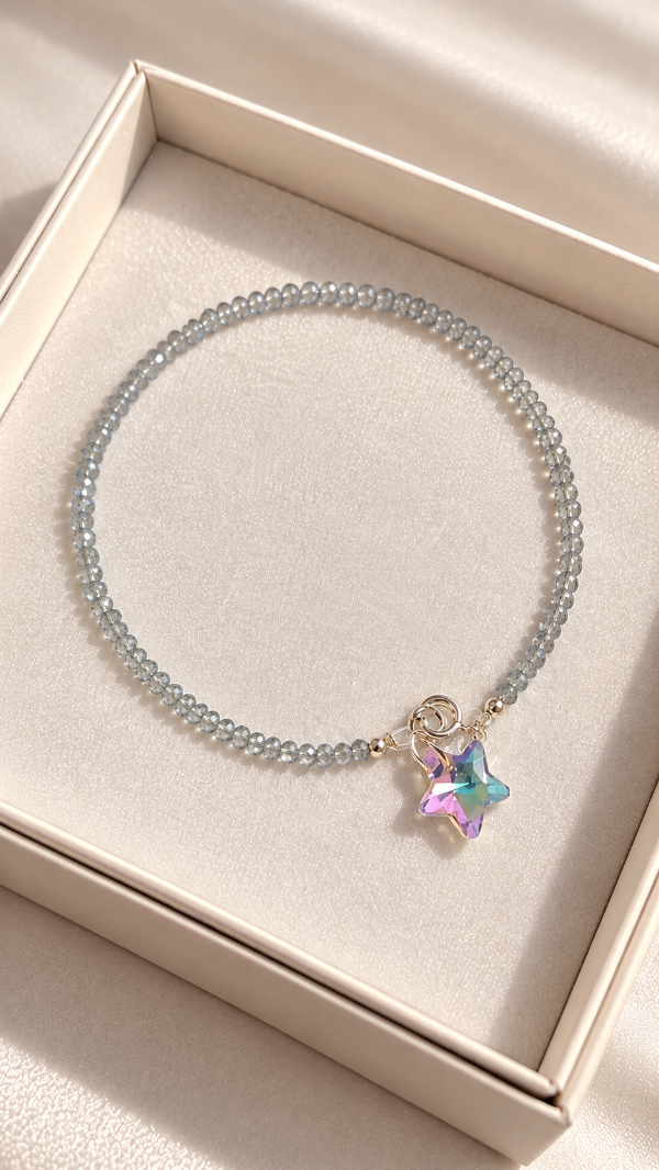 Producto - Pulseras cristal con dije estrella gris tornasol lila