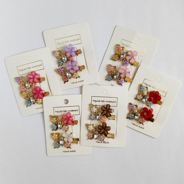 Producto - Par de hebillas mariposa con florcitas 1