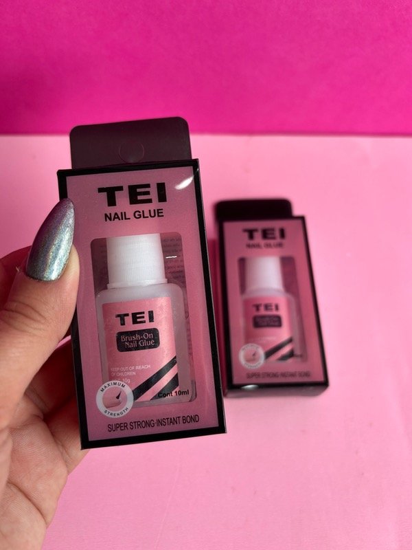 Producto - Pegamento glue tei