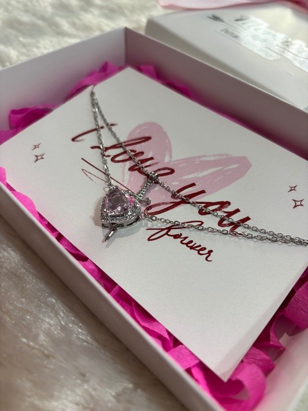 Producto - Collares corazón y daga rosa