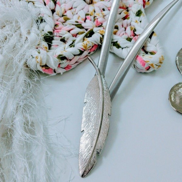 Producto - Cinto pluma