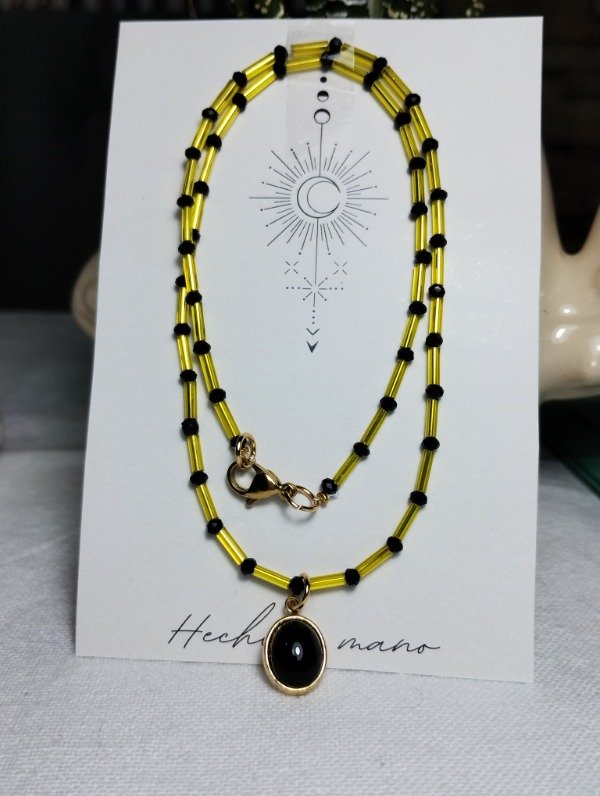 Producto - Collar en tonos dorado y negro