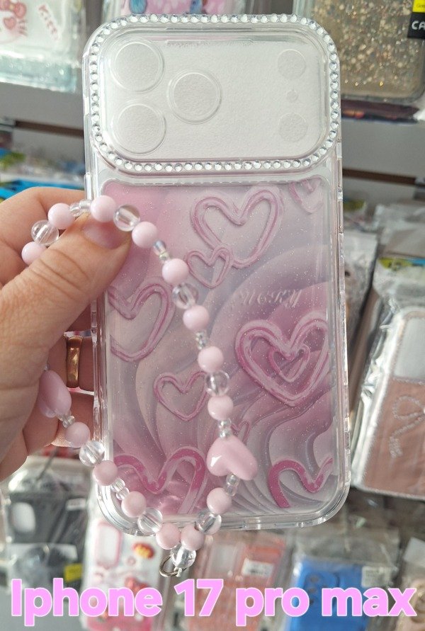 Producto - Fundas reforzadas 360 corazones glitter y strapp. IPhone 17 pro max