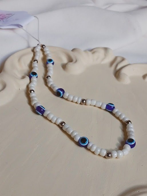 Producto - Correa para celu ojo turco