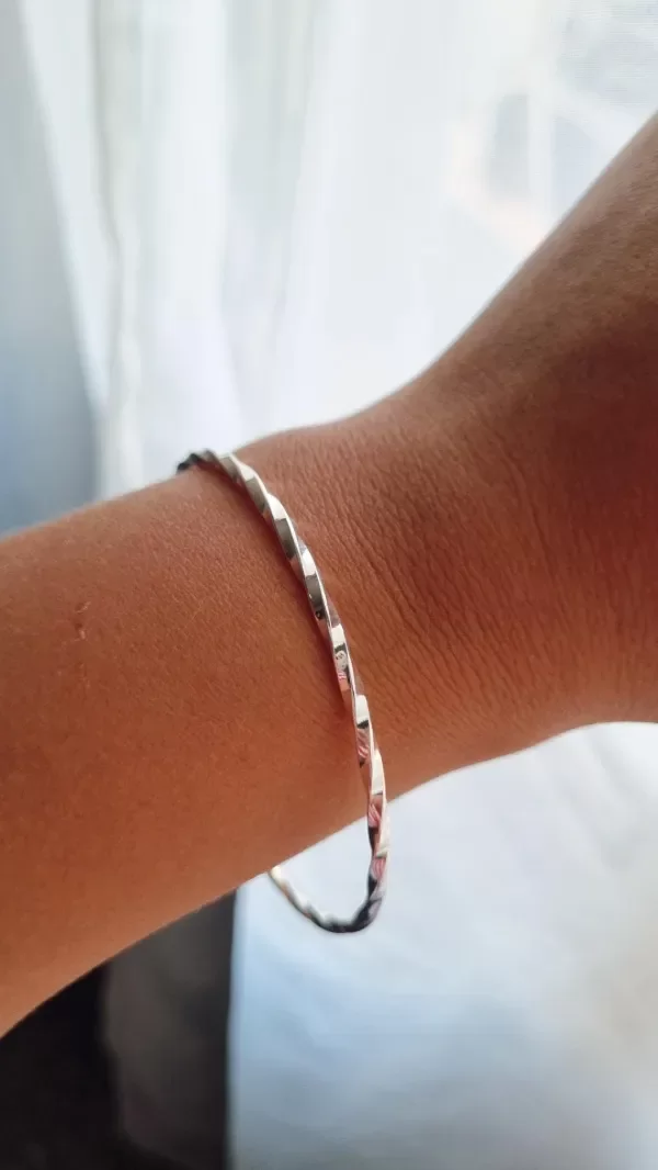 Producto - Esclava torzada acero blanco