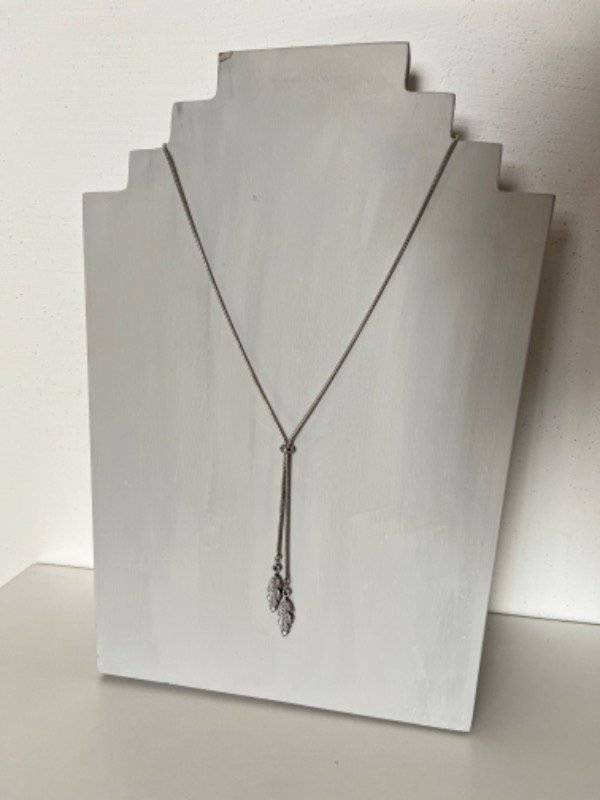 Producto - Corbatero pluma