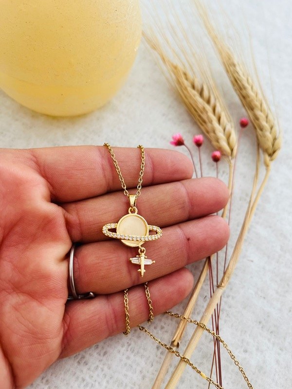 Producto - Cadena Saturno acero dorado