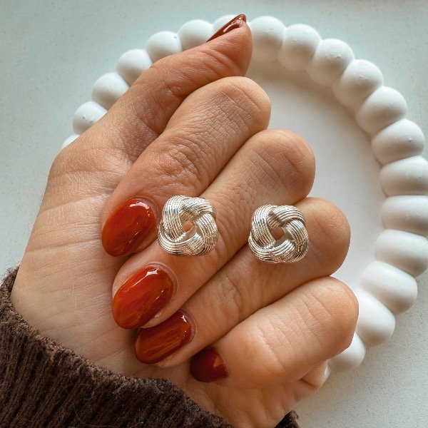 Producto - Aro pasante nudito con detalles - acero blanco