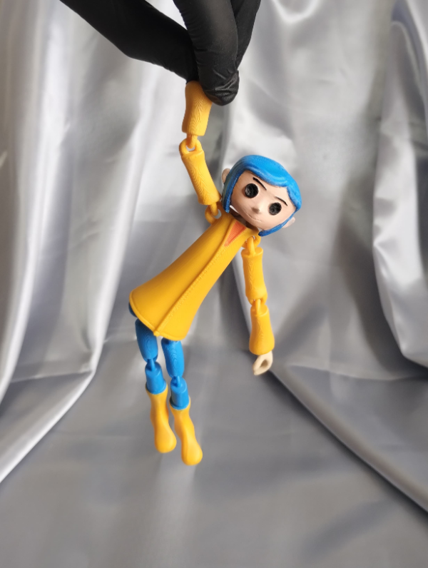 Producto - Flexi Coraline Doll
