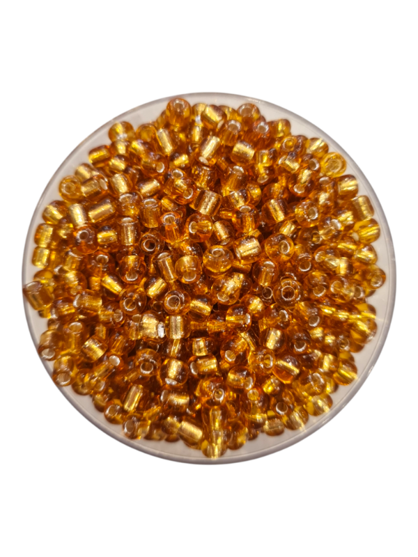 Producto - MOSTACILLONES DORADO TRANSPARENTE