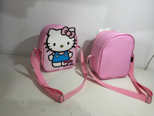 Producto - Cartera kitty (viene con el nombre del personaje) demora 20 dias