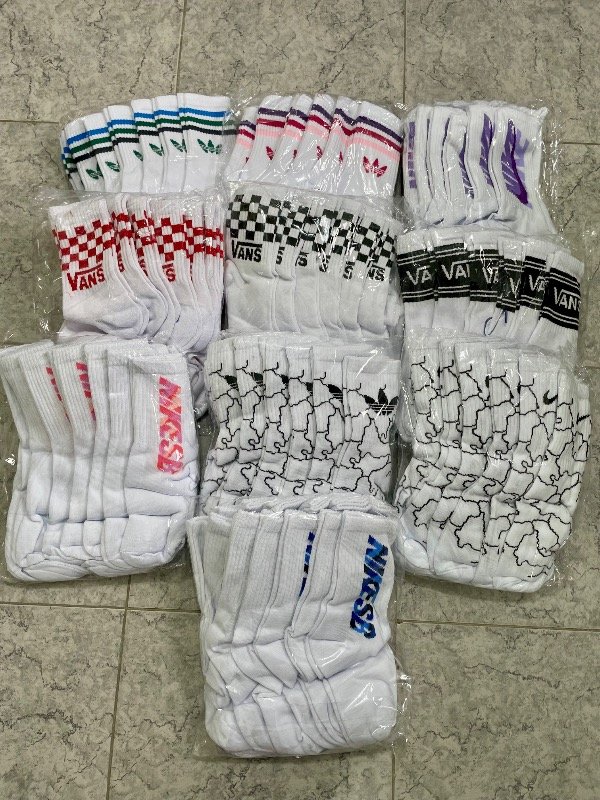 Producto - Docena surtida de tenis blancas