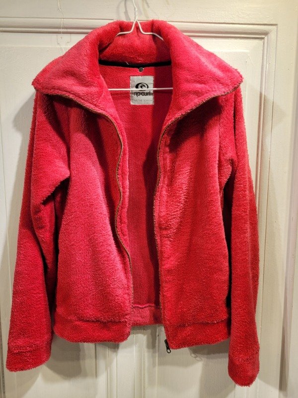 Producto - Polar RIP CURL fucsia Talle S - PRECIO: 50X