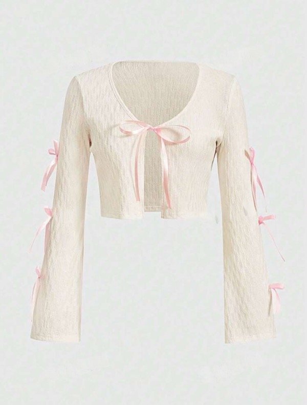 Producto - Saquito monet con moños