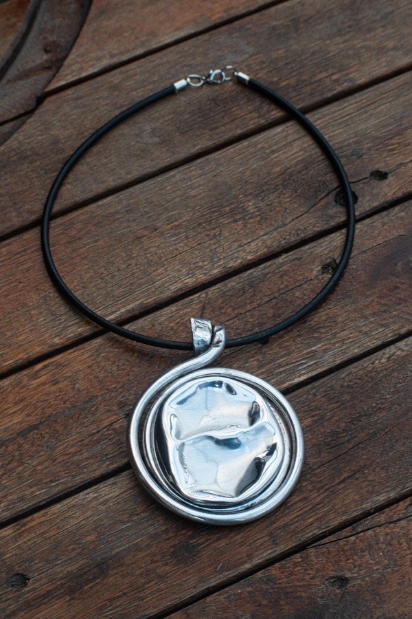 Producto - Dije aluminio centro con relieve