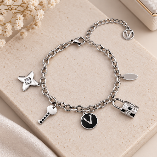 Producto - Pulsera con dijes treboles y candados plata - 0