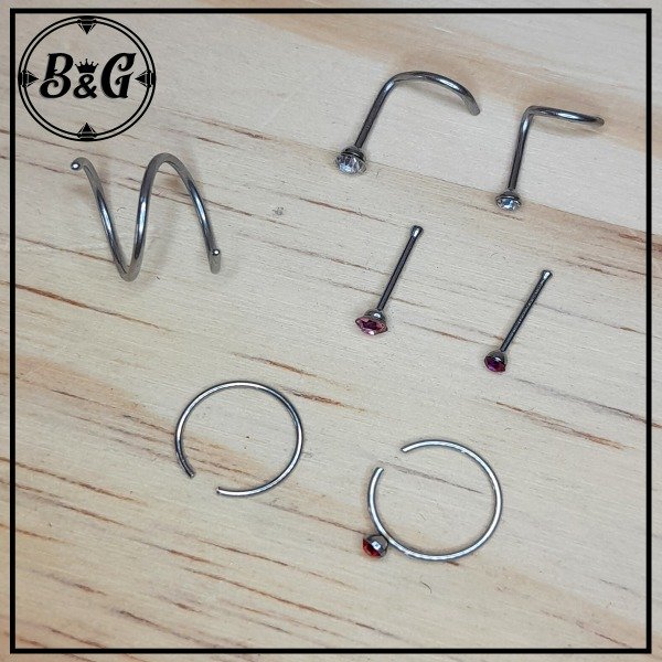 Producto - 1 Doble Sin fin Plateada+4 Nostril/Argollitas a elección (x5 Unidades)