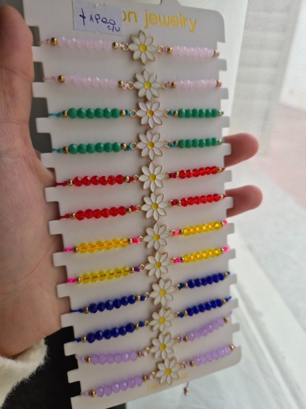 Producto - Pulseras regulables margaritas colores