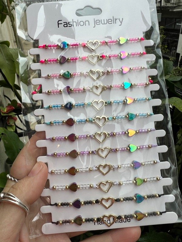 Producto - 12 pulseras de hilo con accesorios