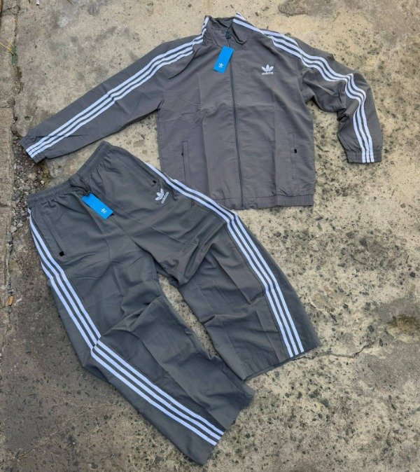 Producto - Conjunto Adidas Importado Rompe viento GRIS